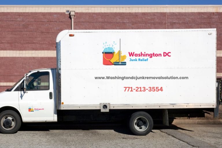 White truck displaying the Washington, DC logo, associated with a local junk removal service.